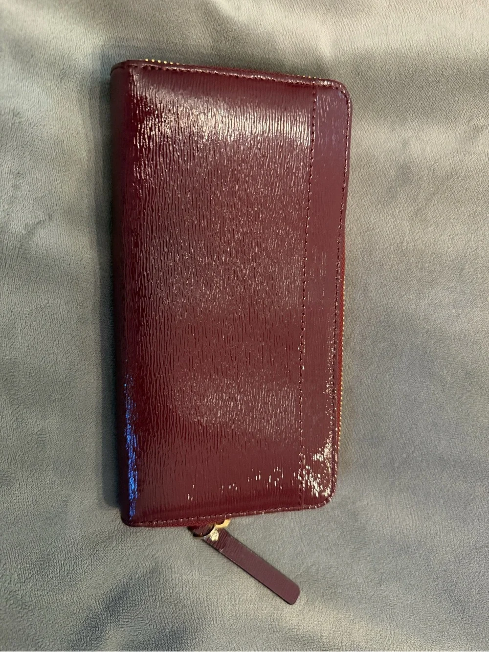 kate spade patent zip-around wallet in burgundy